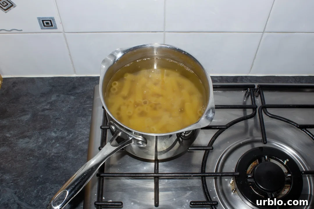 Pasta being boiled in a saucepan