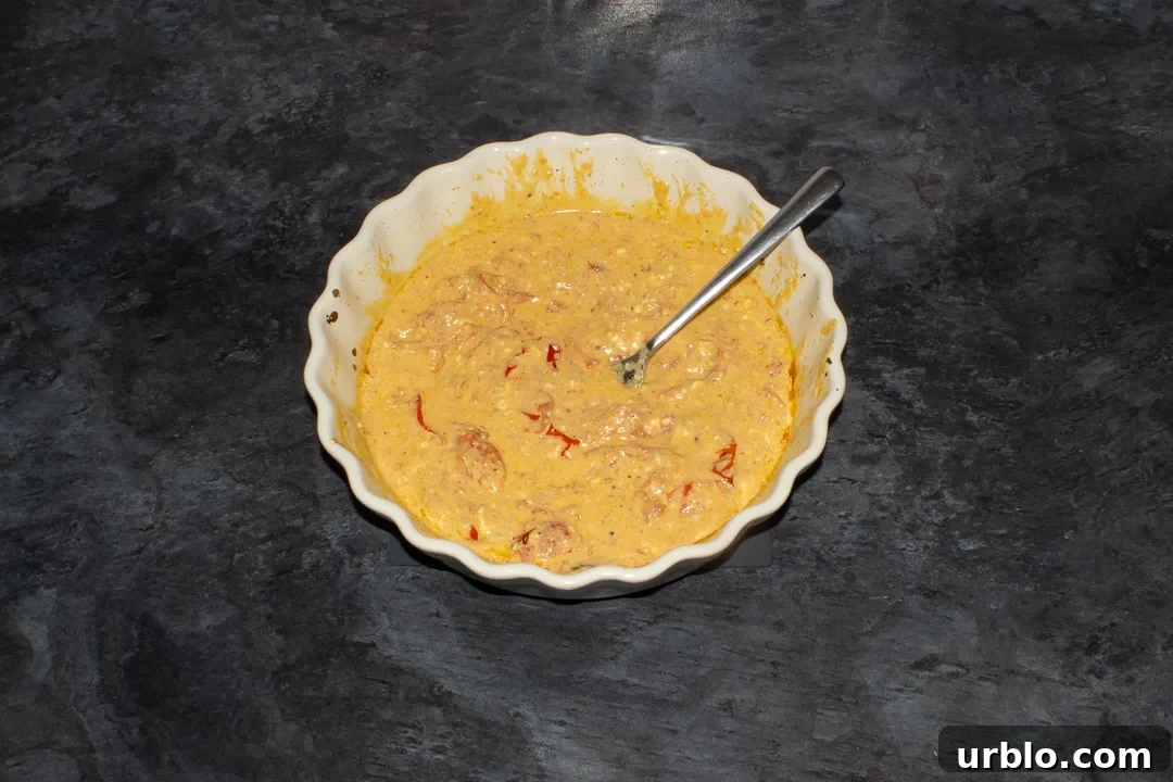 Baked feta tomato pasta sauce in an ovenproof dish