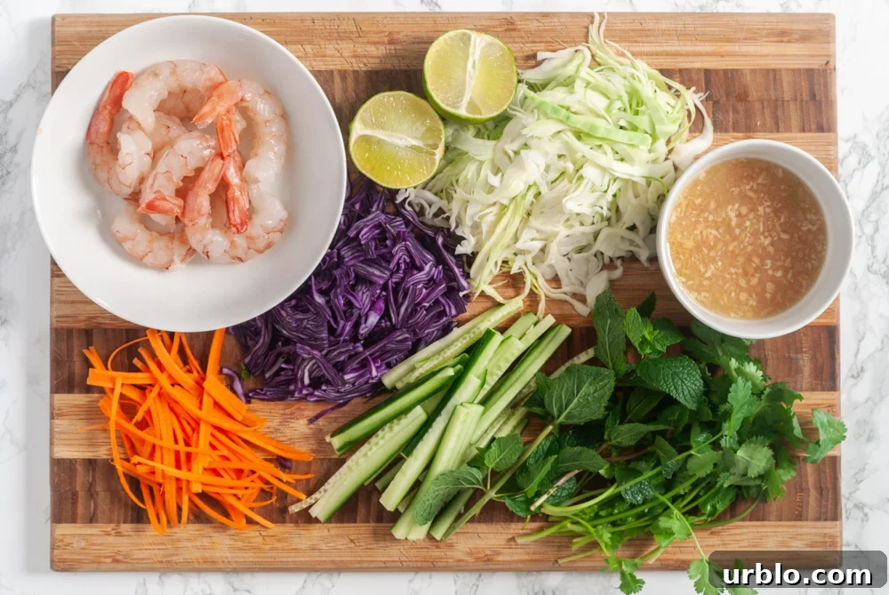 ingredients for Vietnamese shrimp salad chopped on a cutting board
