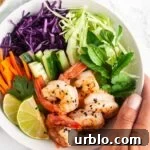 A close up view of a bowl of Vietnamese shrimp salad.