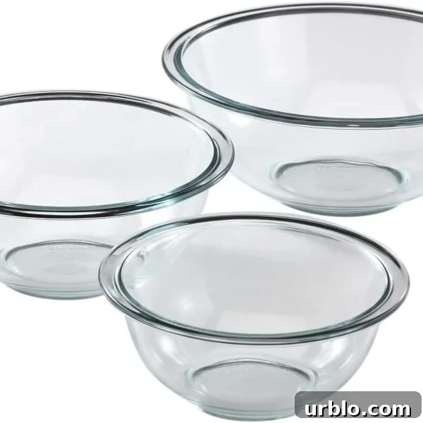 Three clear glass mixing bowls of different sizes