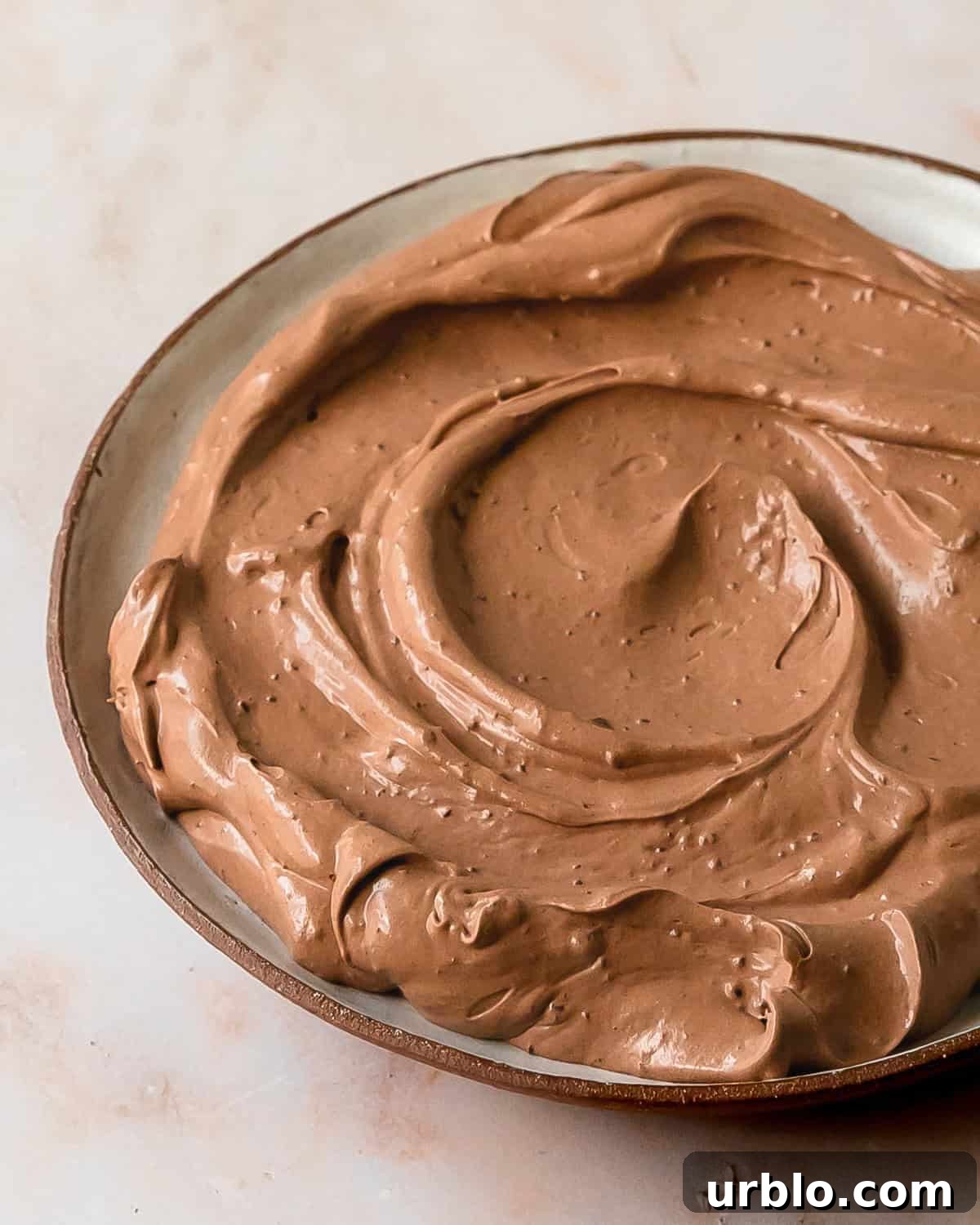 Chocolate cool whip on a dessert