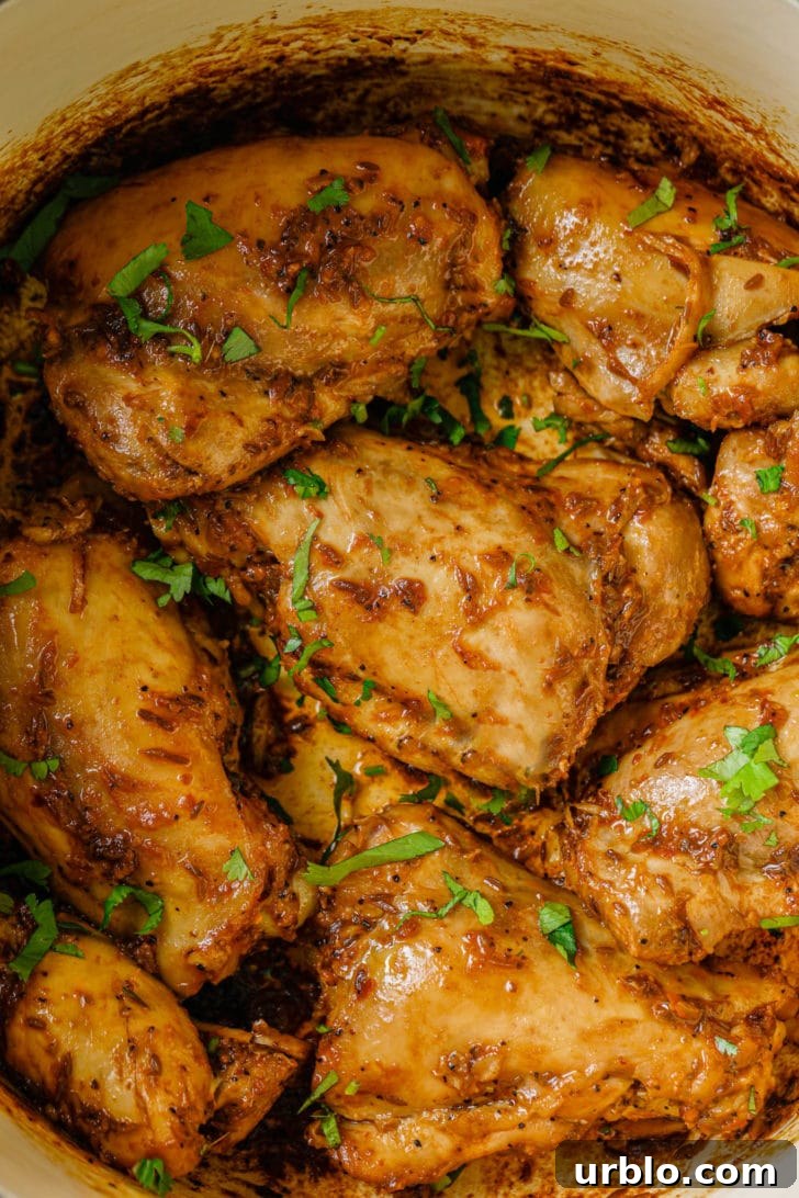 Cooked Bone-in Chicken Thighs garnished with cilantro