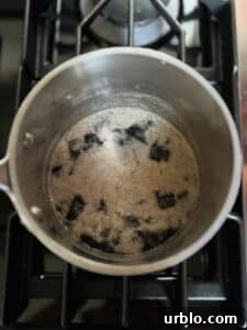 Filling boiling in pot when it's almost ready and you can see some white foam on the top.
