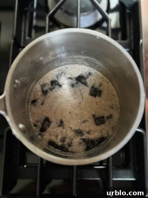 Filling boiling in pot when it's almost ready and you can see some white foam on the top.