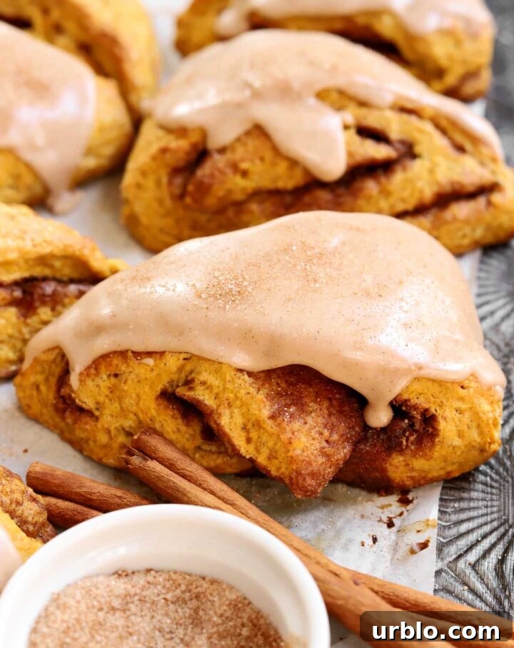 cinnamon swirl pumpkin scones with glaze