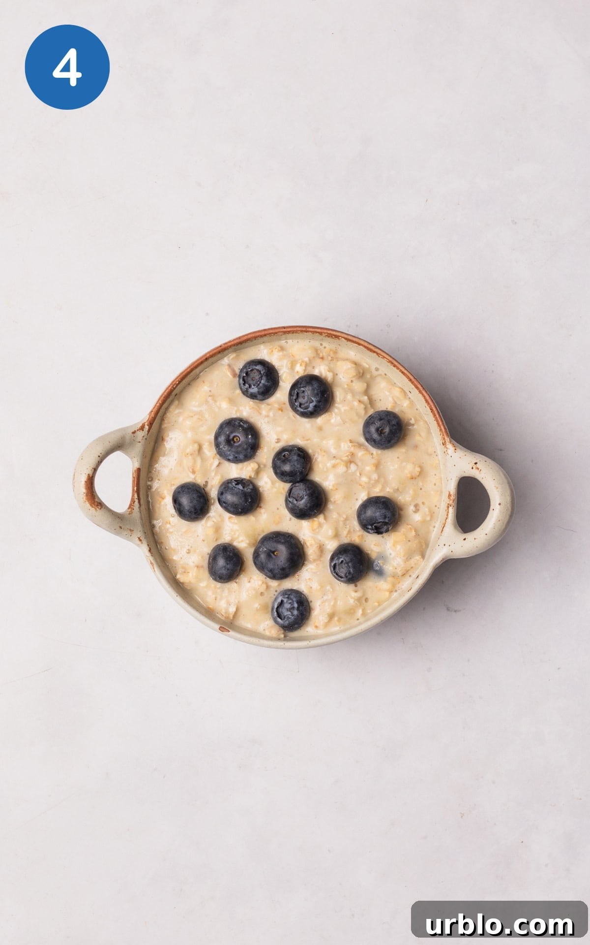 oatmeal mixture poured into an ovenproof ramekin.