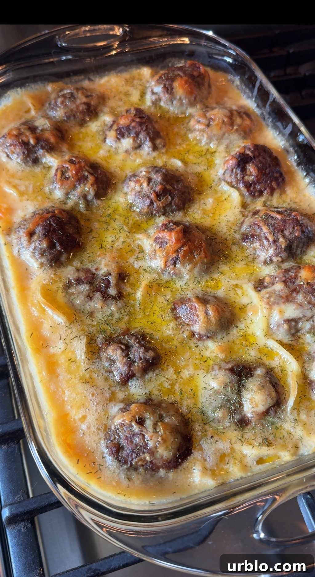 Au Gratin Meatballs in a glass baking dish.