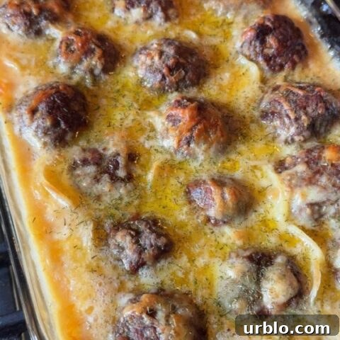 Au Gratin Meatballs in a glass baking dish.