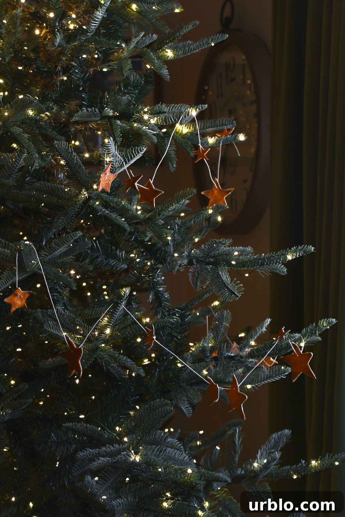 Orange Peel Star Garland strung up on a tree.