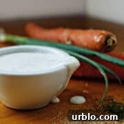 homemade ranch dressing in a white bowl