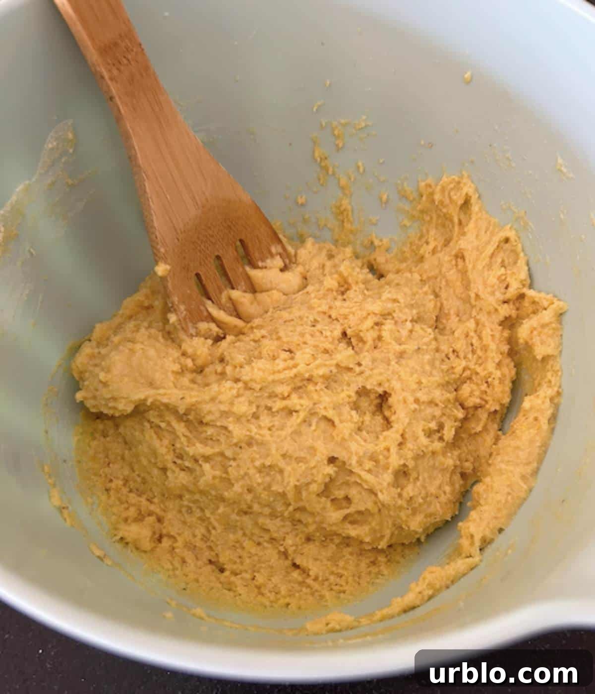 Moist Fluffy Cornbread Recipe Without Buttermilk 5 Batter for cornbread in bowl.