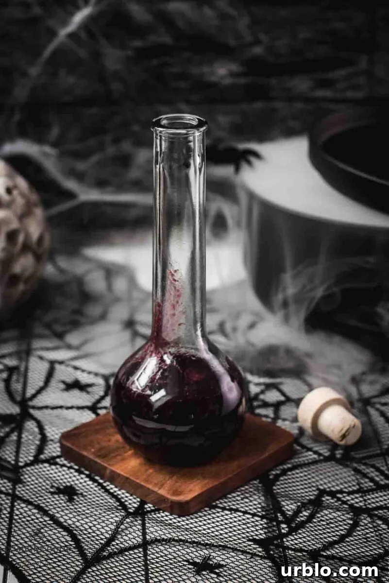 Eerily beautiful, decorated with cobwebs and a black, steaming cauldron.