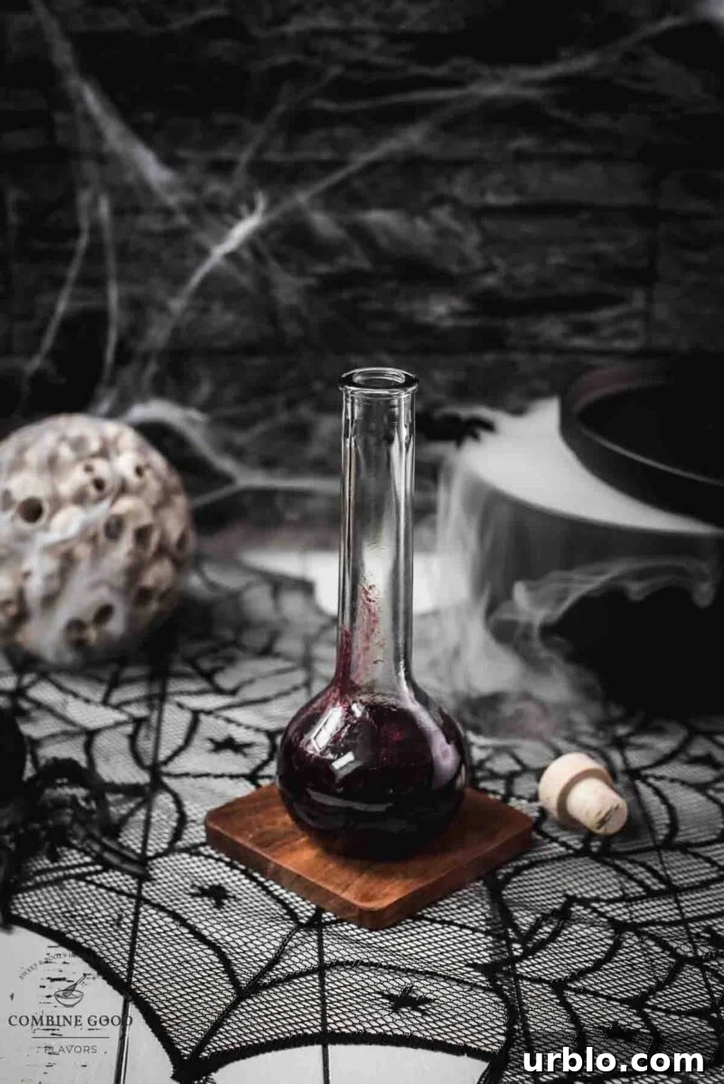 Eerily beautiful, decorated with cobwebs and a black, steaming cauldron.