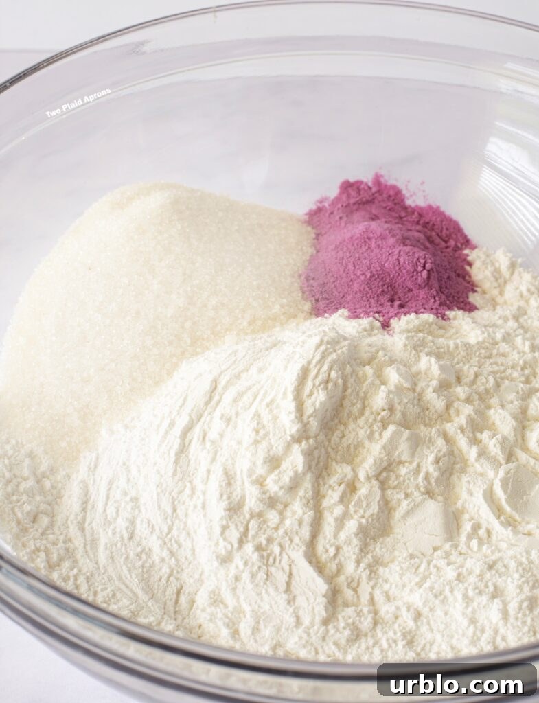 Dry ingredients for the ube mochi in a glass bowl.