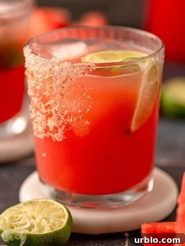 Watermelon margarita with a salt rim.