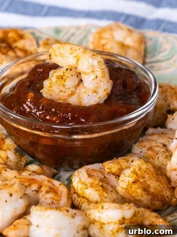 Shrimp Cocktail dipped in cocktail sauce