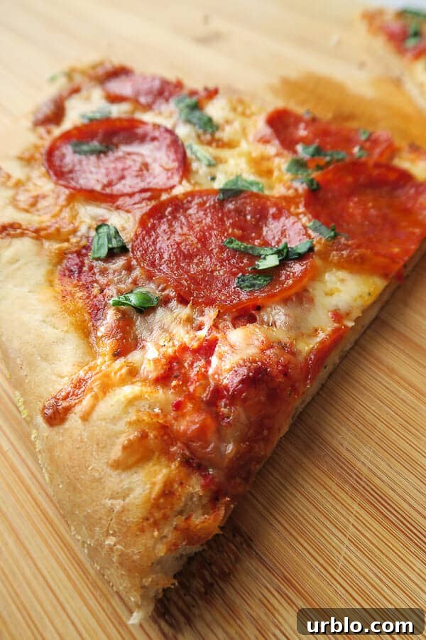 pepperoni thin crust pizza slice