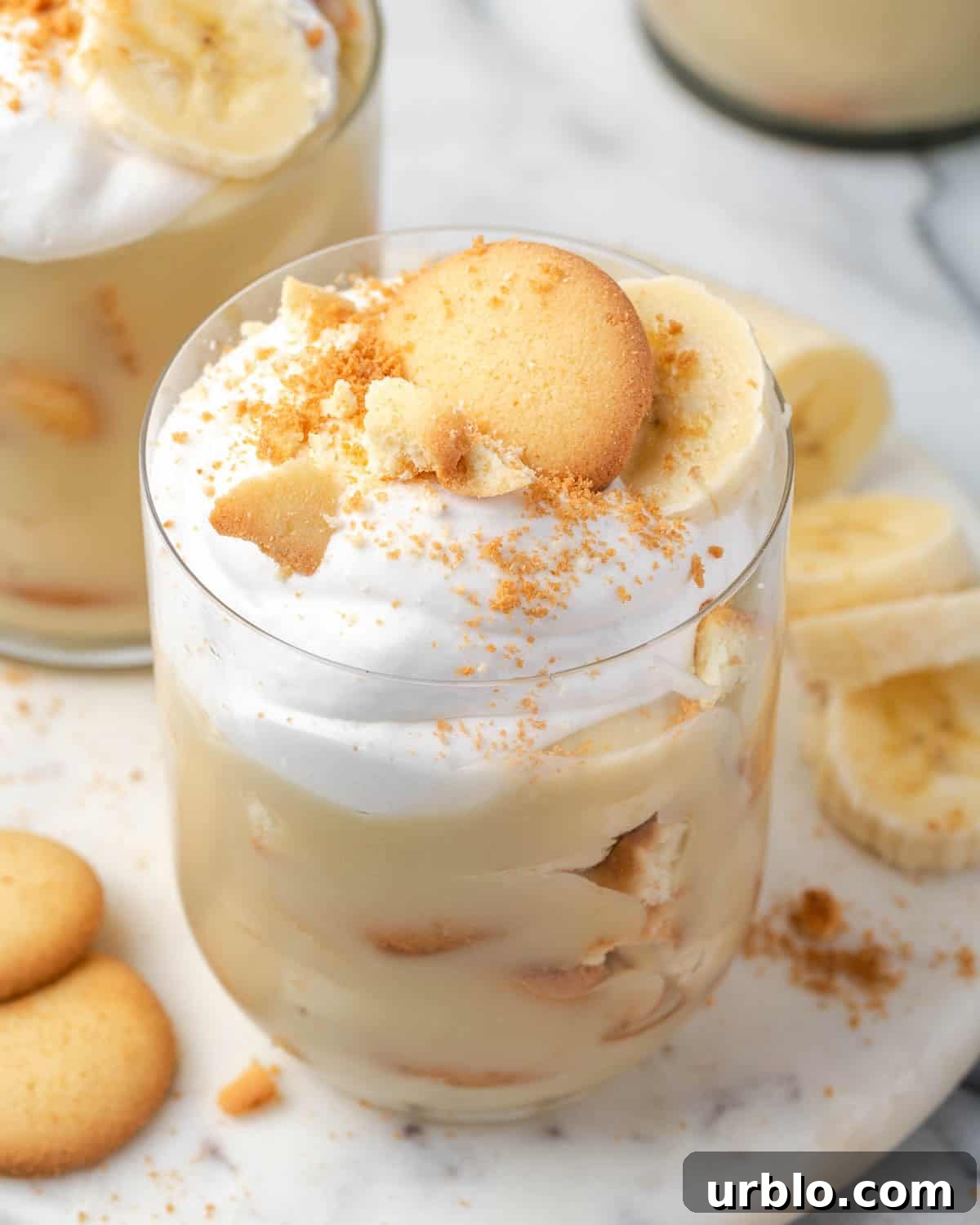 An individual gluten free banana pudding made in a serving glass. 