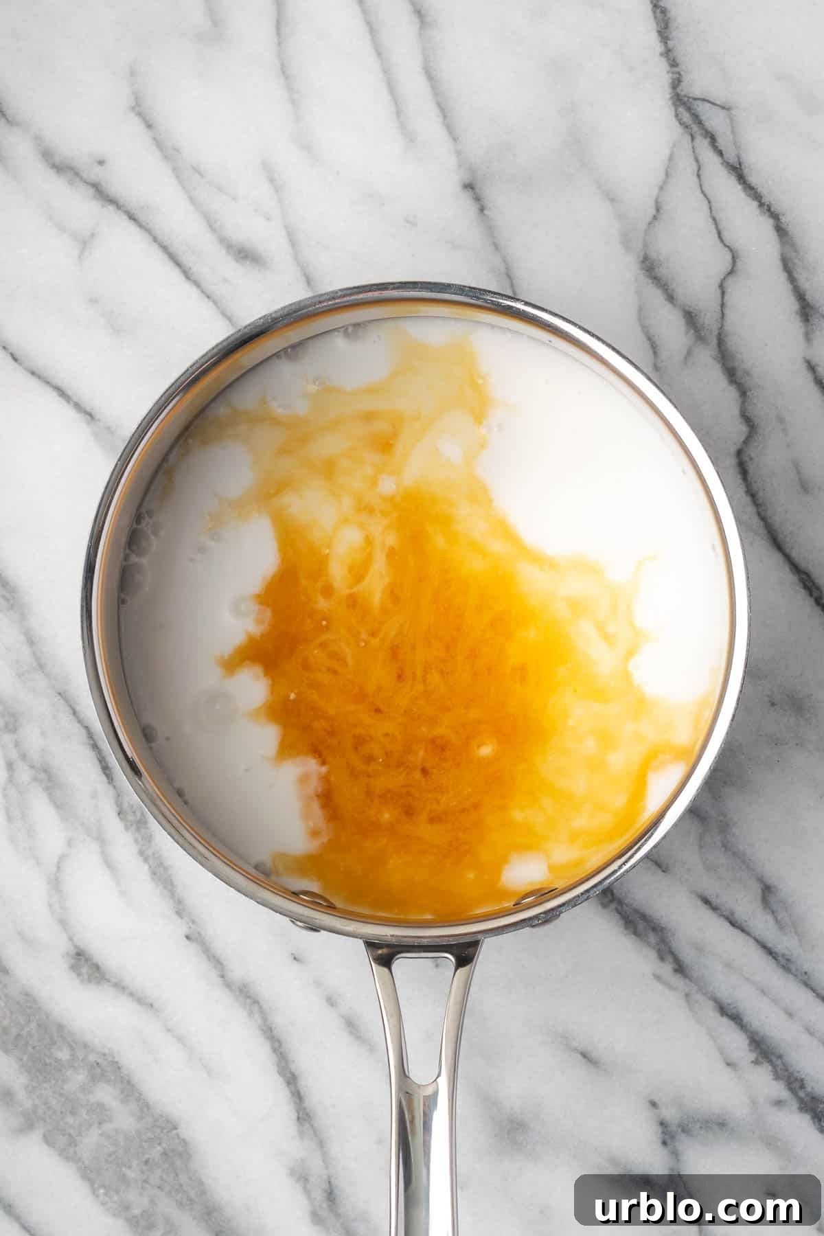 Milk, sugar, vanilla and salt in a medium saucepan. 