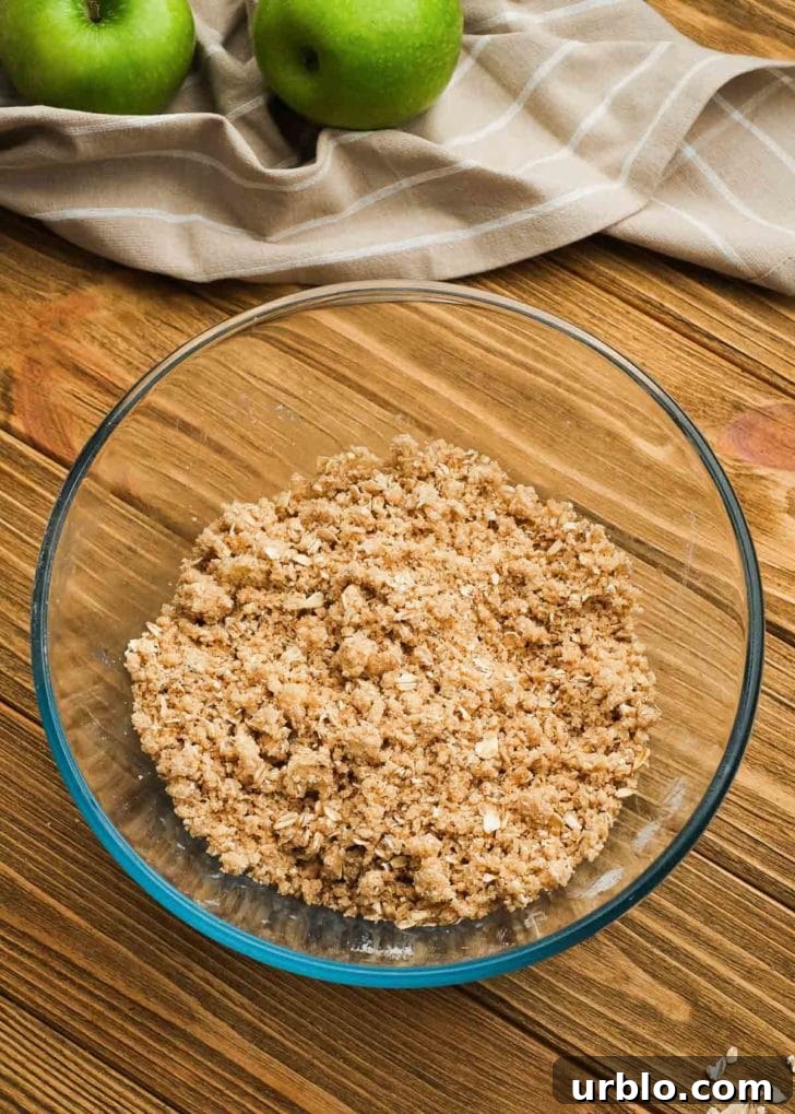 crumble topping ingredients in a clear mixing bowl