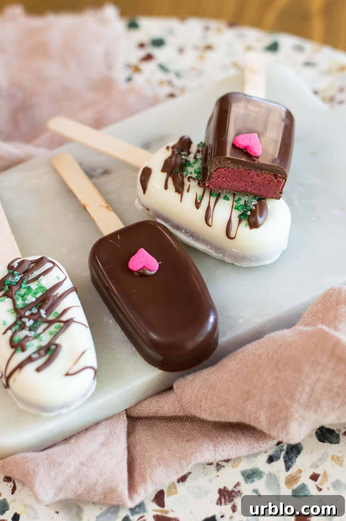 Cakesicles on a marble plate