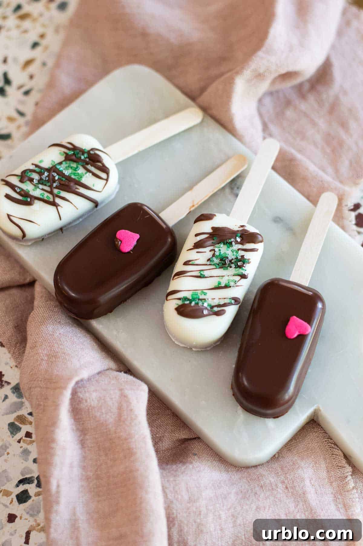 Cakesicles on a marble plate