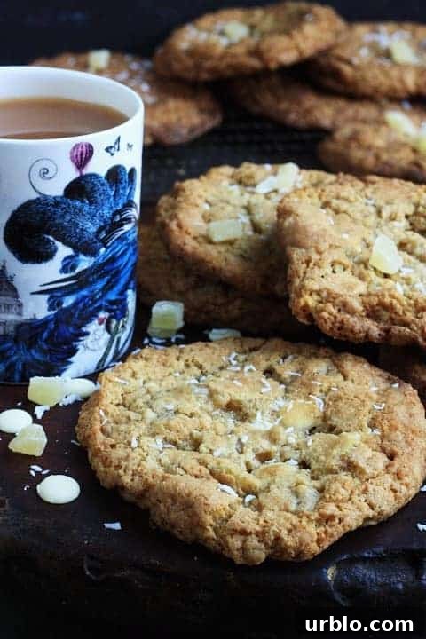 plate of cookies next to cup of tea