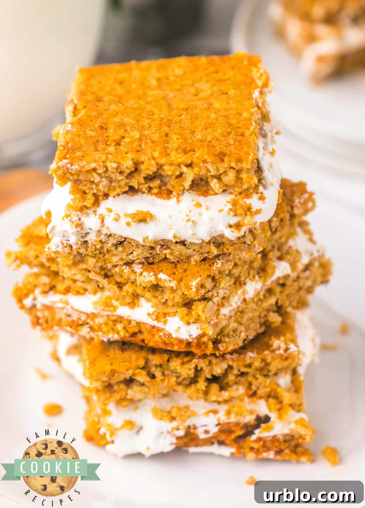 Oatmeal sandwich cookie bars with marshmallow cream filling.