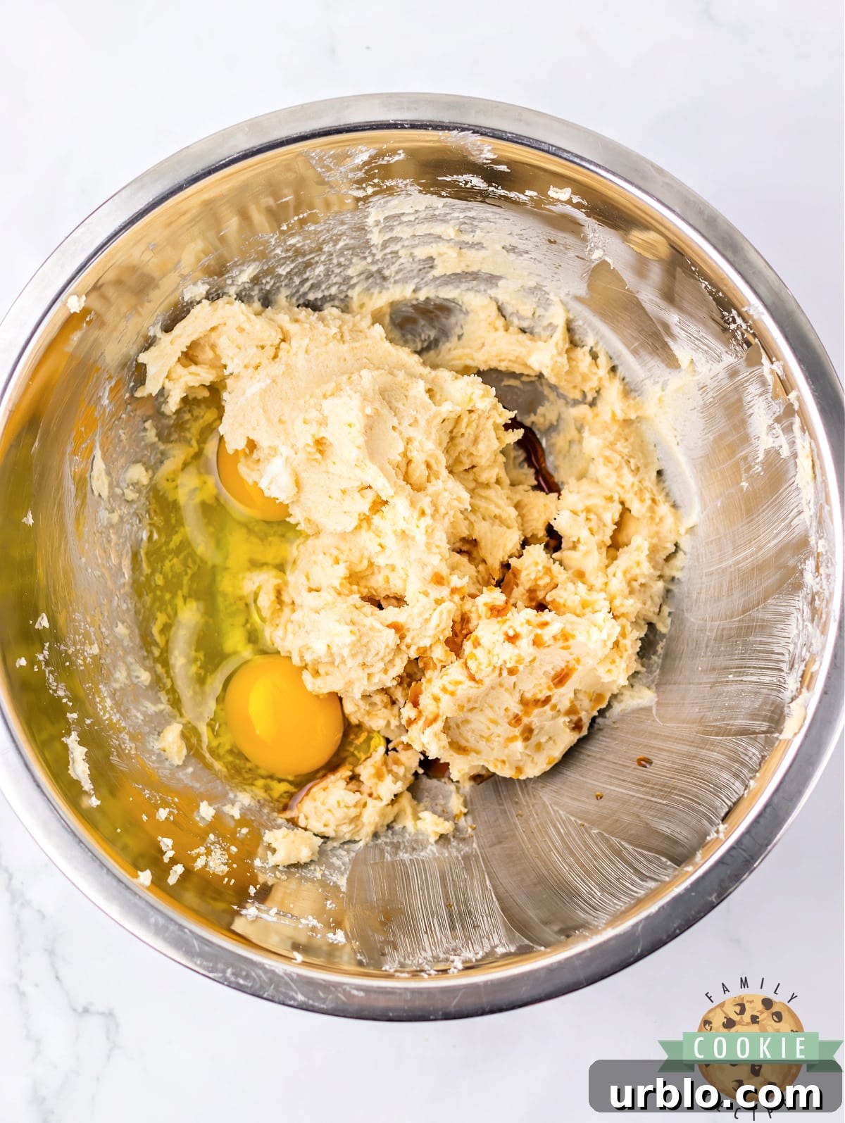 Add egg and vanilla to cookie dough.