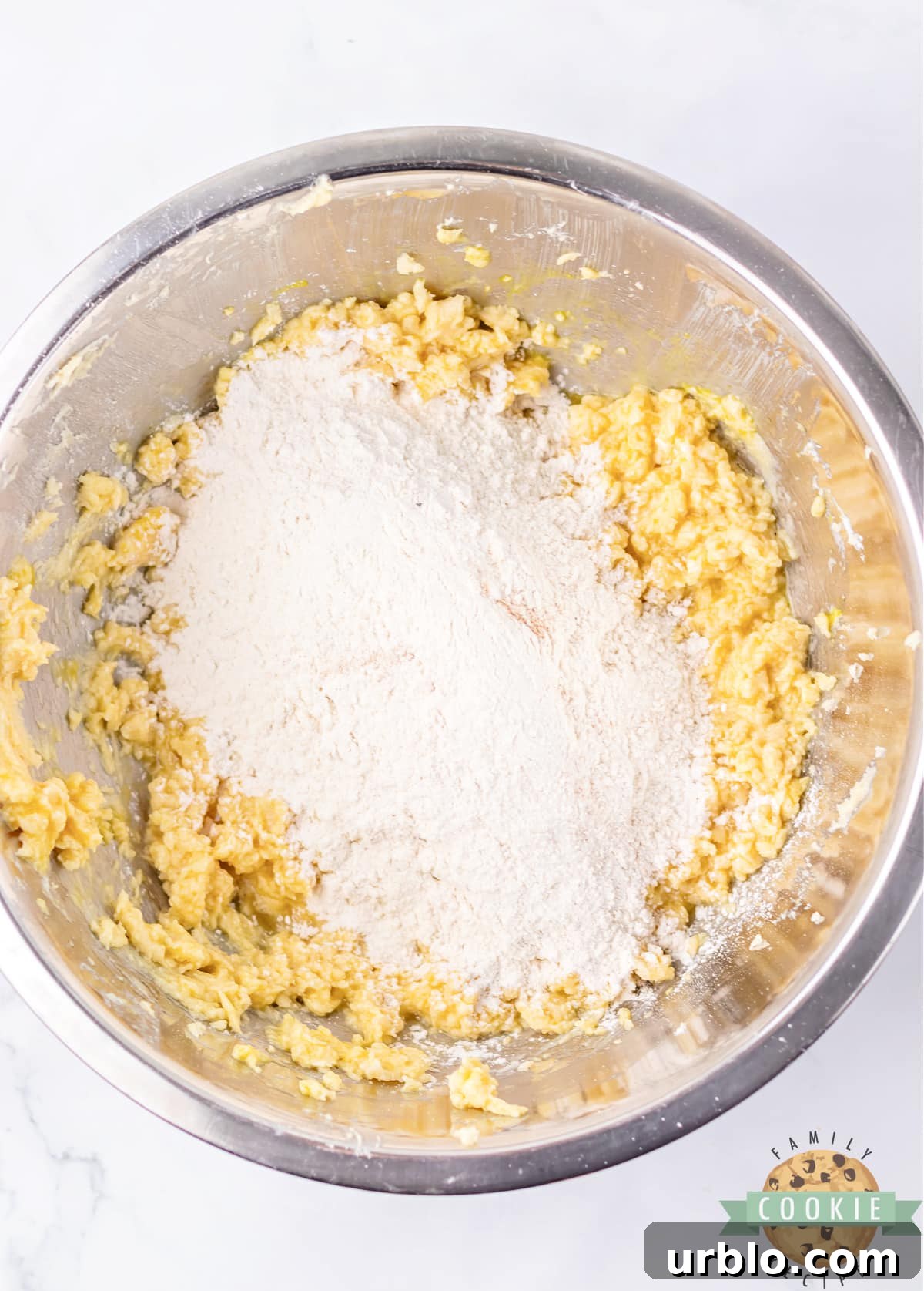 Add the dry ingredients to the creamed butter/sugar mixture.