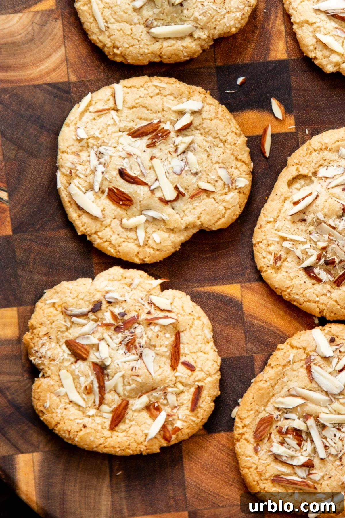 glutenfree almond joy cookies on a wooden chopping board 