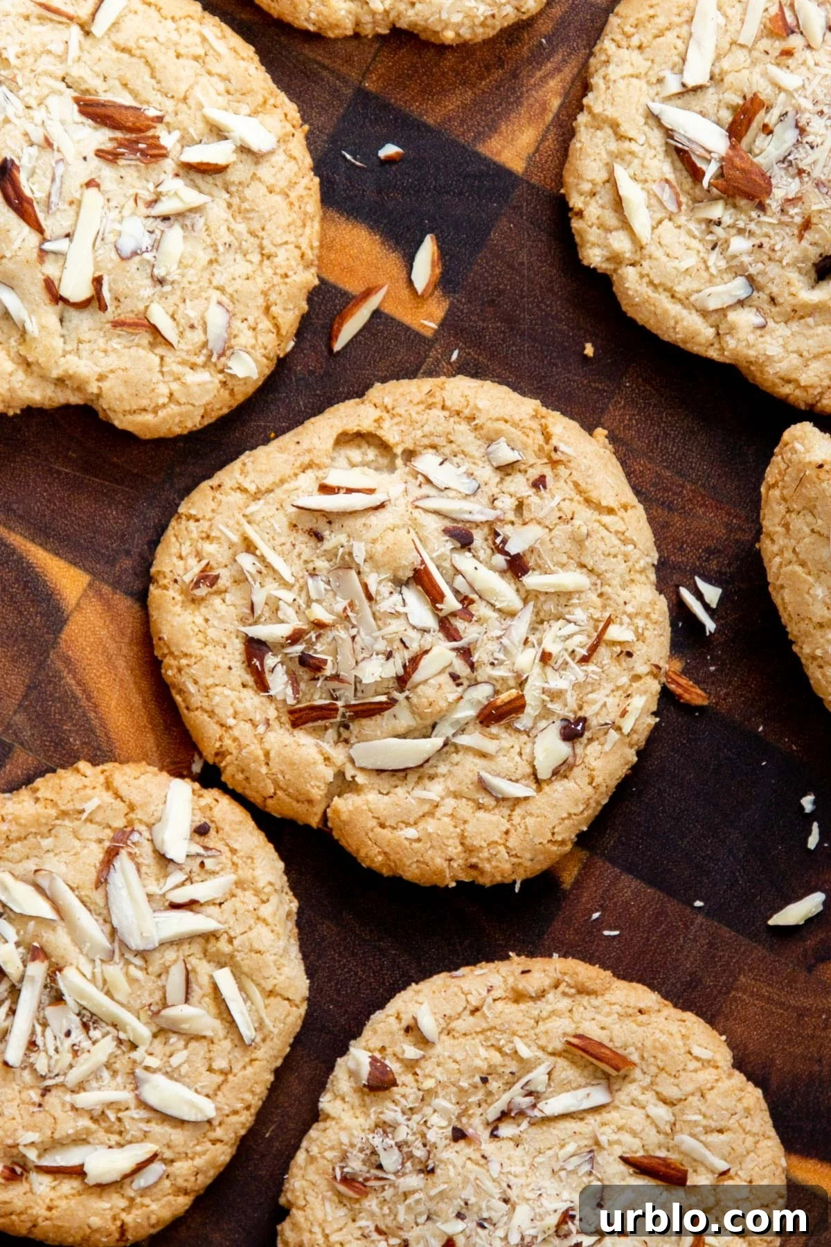 glutenfree vegan almond joy cookies on a wooden chopping board 
