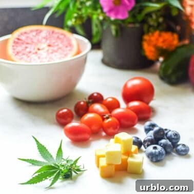 A picture of cannabis leaves, cheese, blueberries and tomatoes.