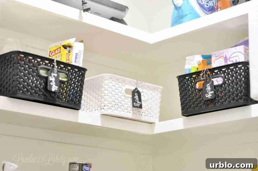 black and white plastic bins on a shelf.