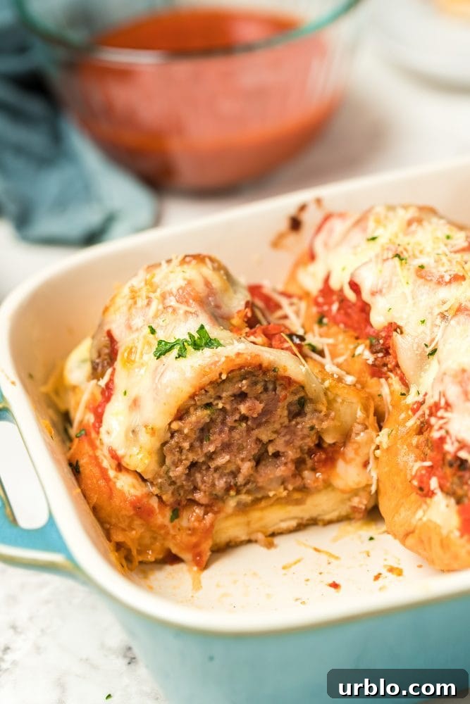 Meatloaf casserole with sauce and baked meatball sandwich elements.