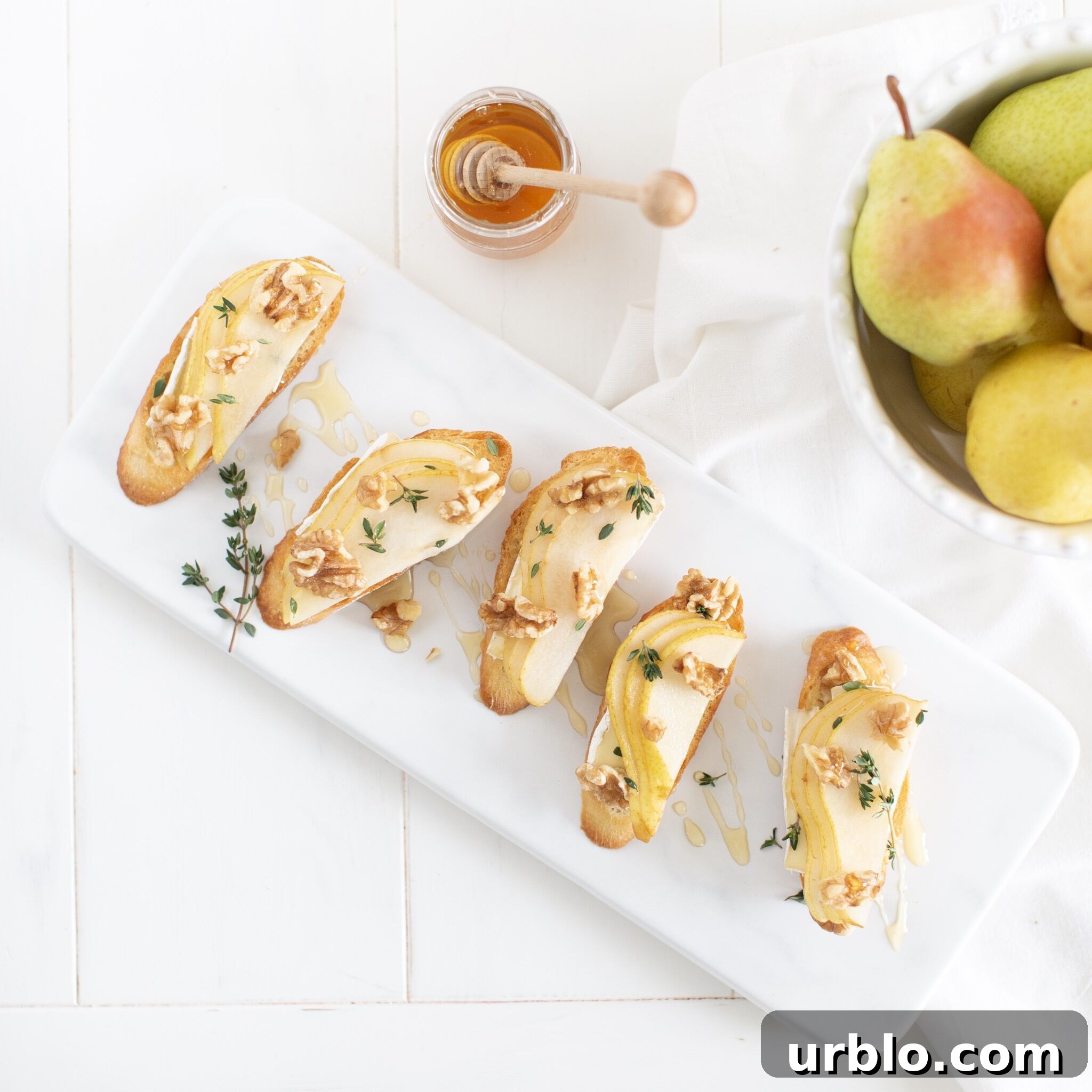 Pear and Brie Crostini with a dairy free option - the perfect easy holiday appetizer!