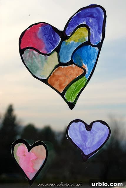 Hearts with Black Glue taped to a window