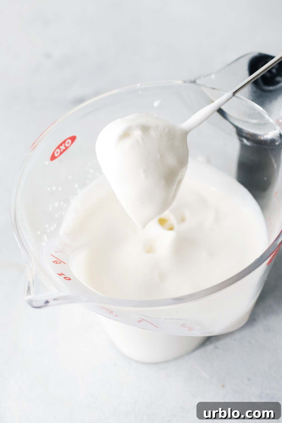 Whipped cream using a handheld milk frother.