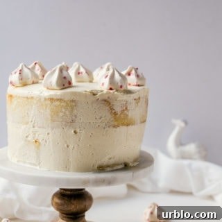 It won't be Christmas without this white chocolate cake with peppermint meringue buttercream frosting.