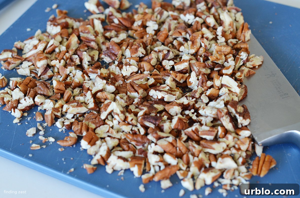 Chopped pecans on a cutting board