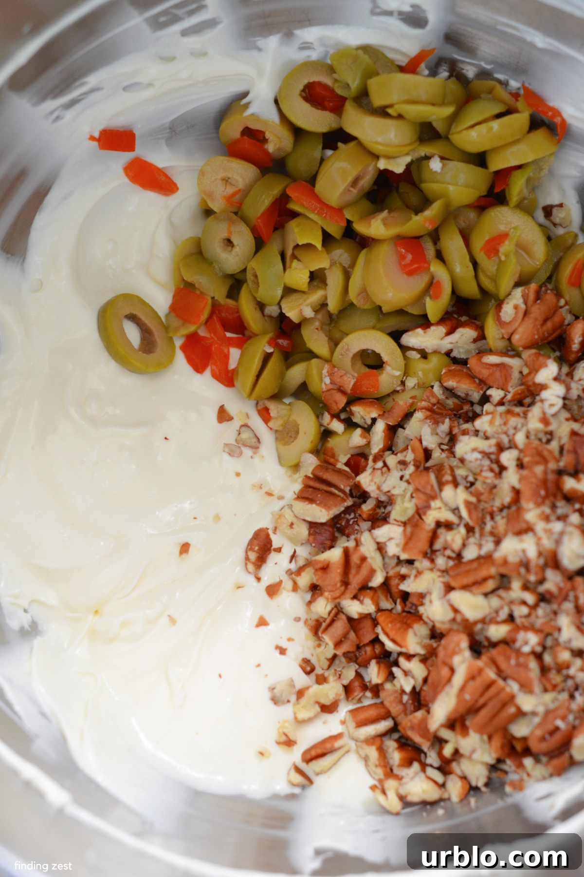 Sliced green olives, cream cheese, mayo and pecans for a dip recipe