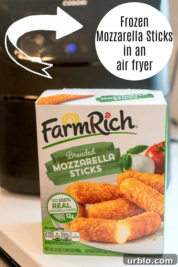 Mozzarella sticks frozen in an air fryer are so easy to make and crunchier than cooking them in your oven! Love fried cheese? This will be your favorite snack. #airfryer #airfryerrecipes #mozzarellasticks #frozenfood #ninjafoodi #foodi #thetypicalmom air fryer frozen mozzarella sticks