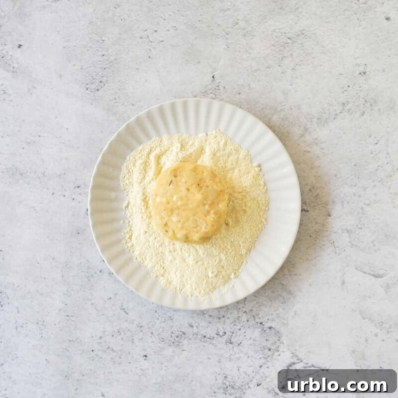 Crispy Potato Fritters Recipe for Golden, Crunchy Hash Browns 6 Coat each patty in cornmeal for a crispy crust.