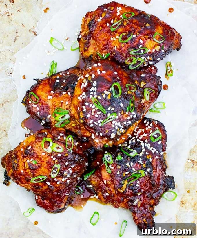 Sticky Asian Grilled Chicken Thighs on white background
