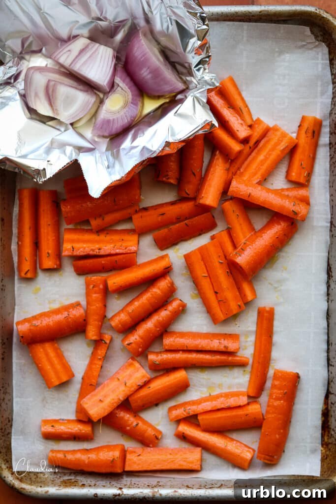 carrots and shallots on sheet pan