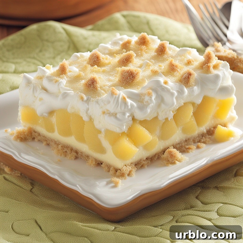 Close-up of a slice of Pineapple Cream Dessert.