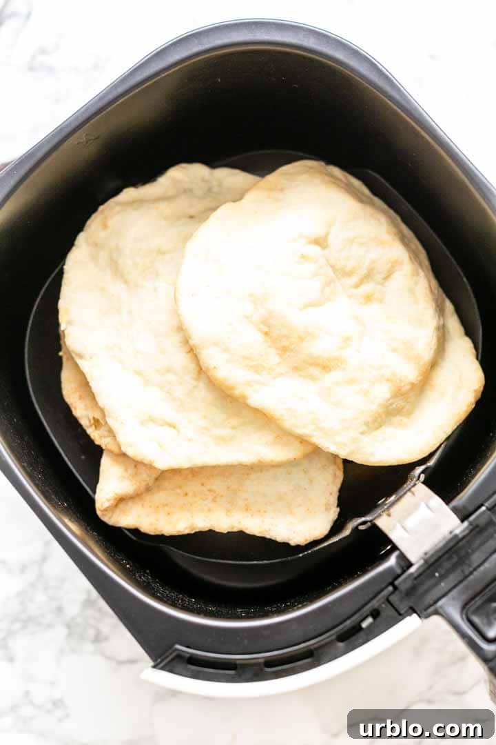 Flour tortilla flatbreads in an Air Fryer or stacked.