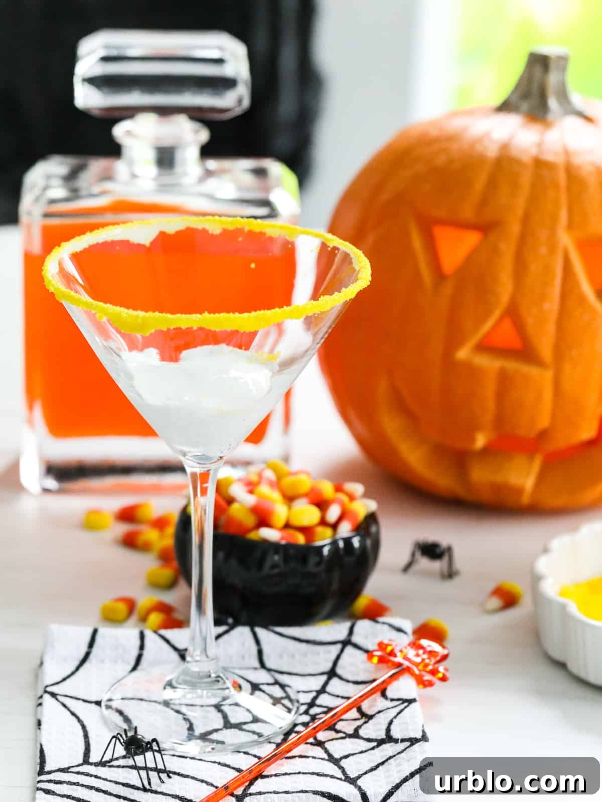 Candy corn martinis with rim and marshmallow fluff
