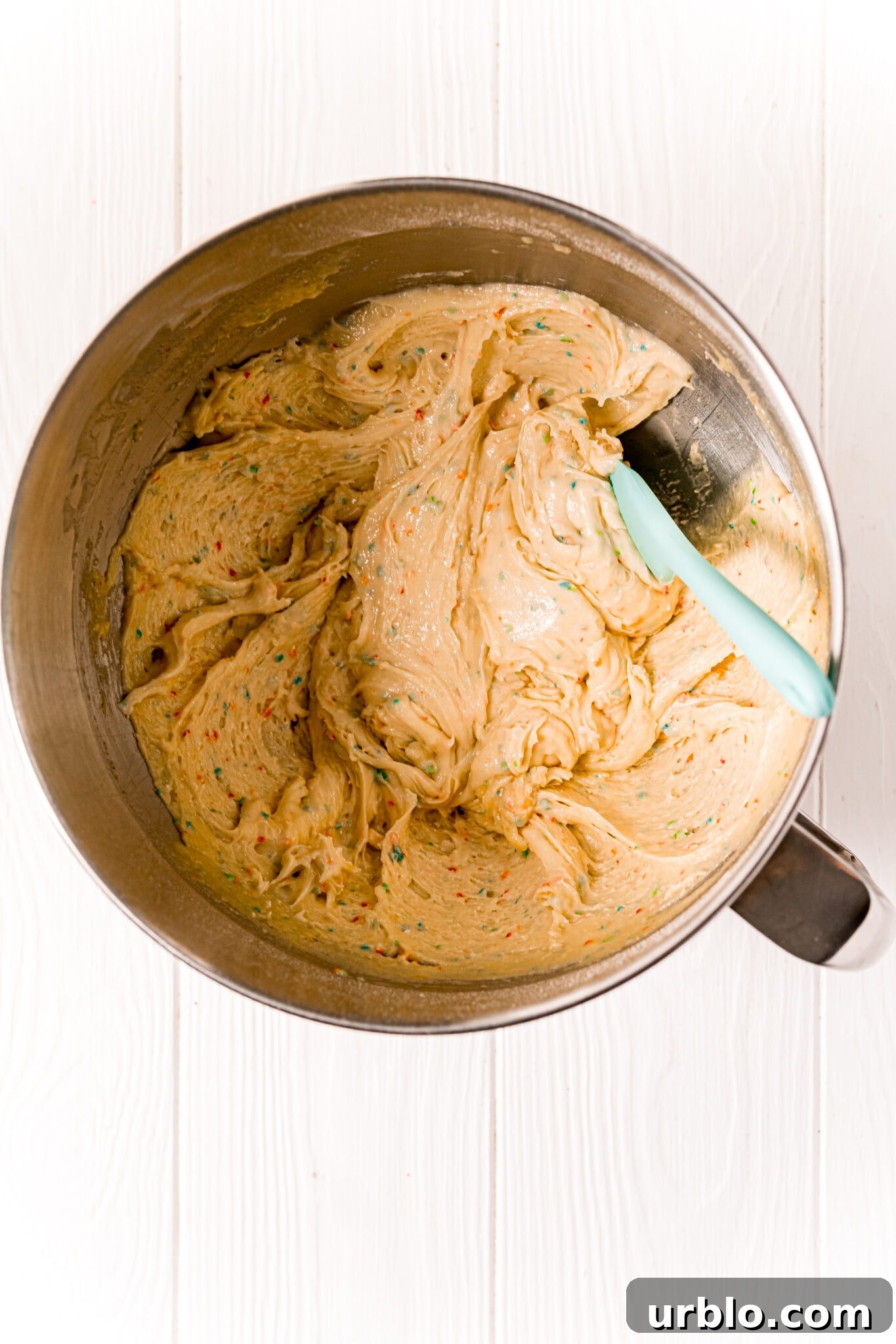 rainbow cake mix cookie in a bowl